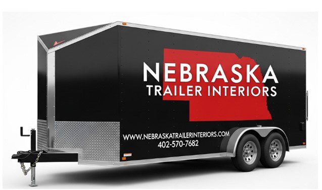 Black trailer with Nebraska Trailer Interiors logo and contact info.